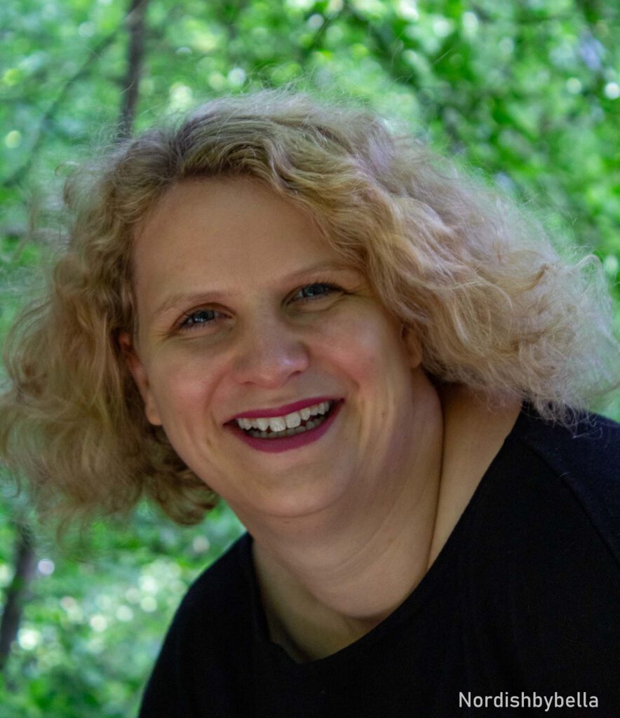 a woman smiling for a picture